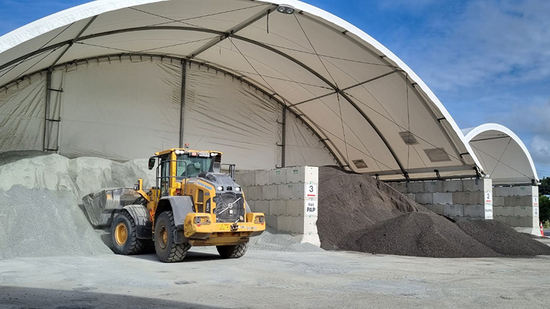 Concrete block mounted fabric shelter