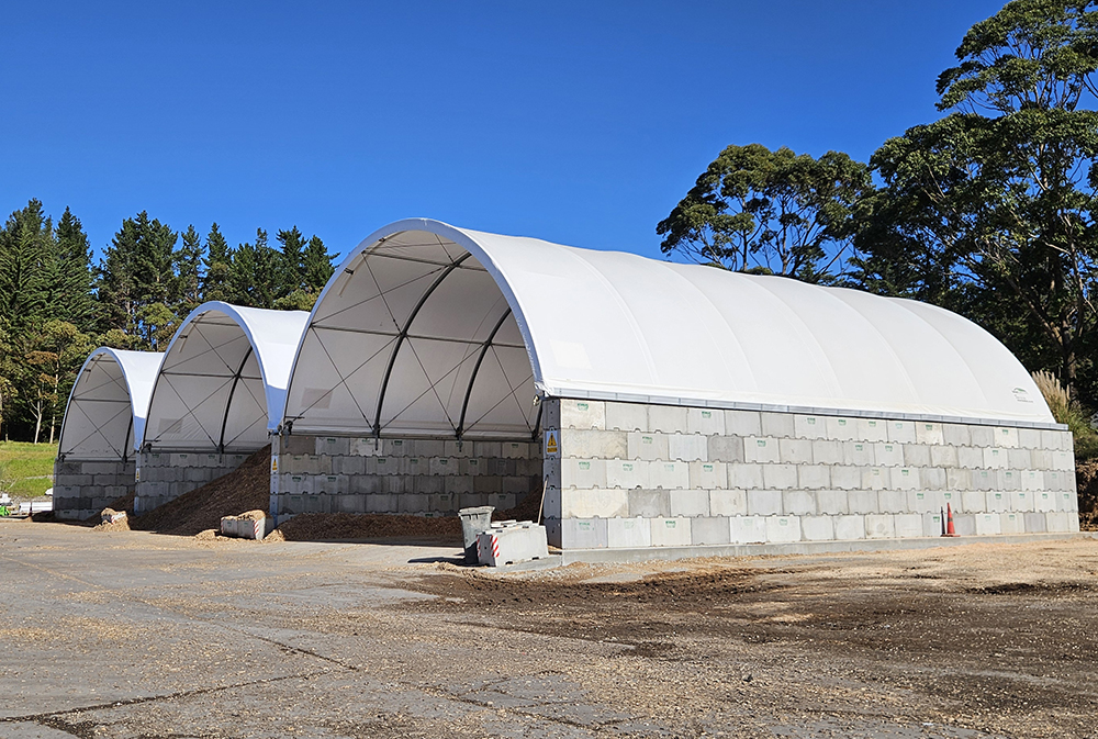 Concrete block mounted fabric shelter