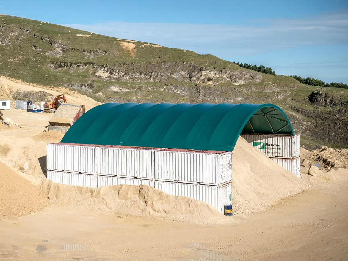 How should fertiliser be stored